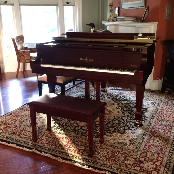 rug under piano